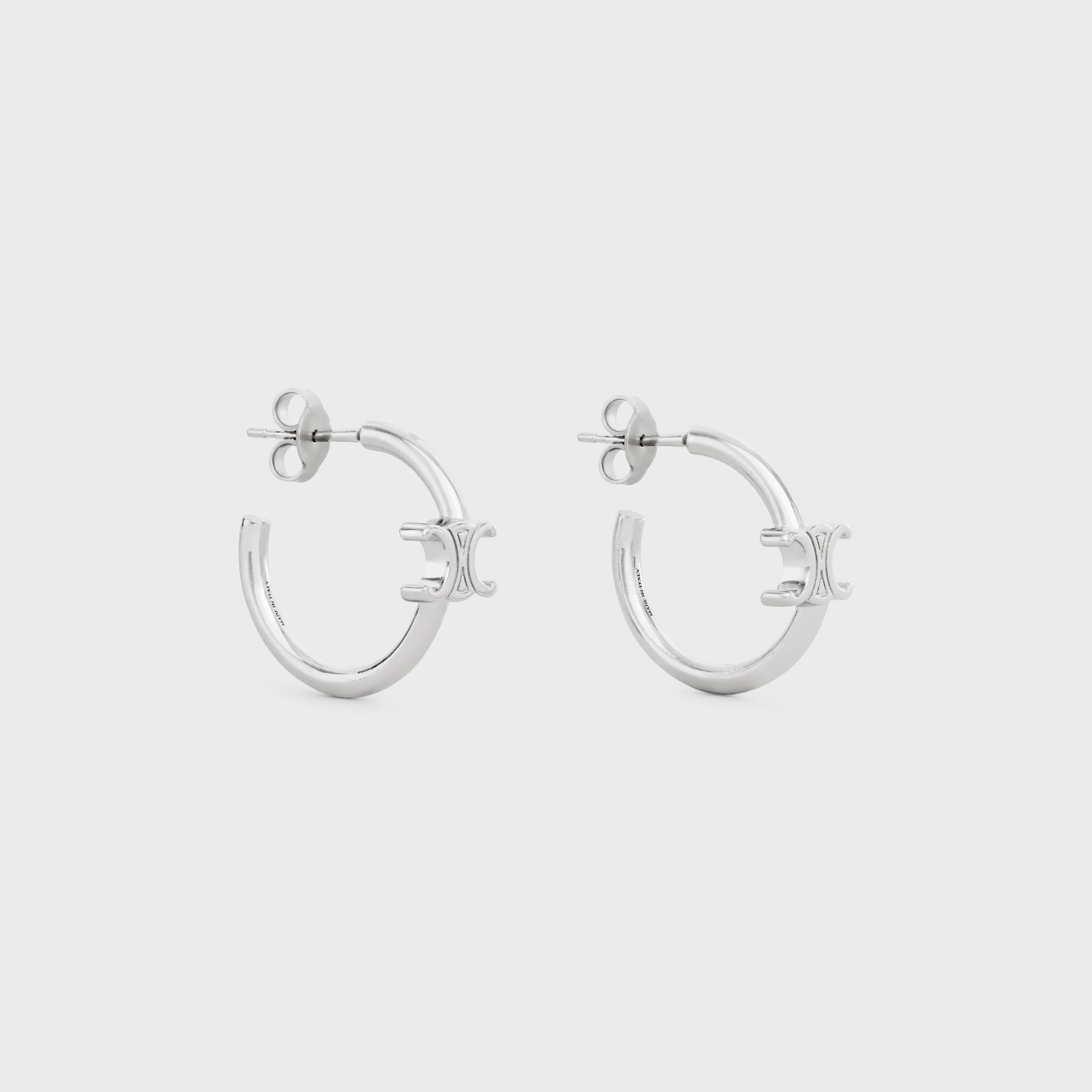 Triomphe Asymmetric Hoops in Brass with Rhodium Finish