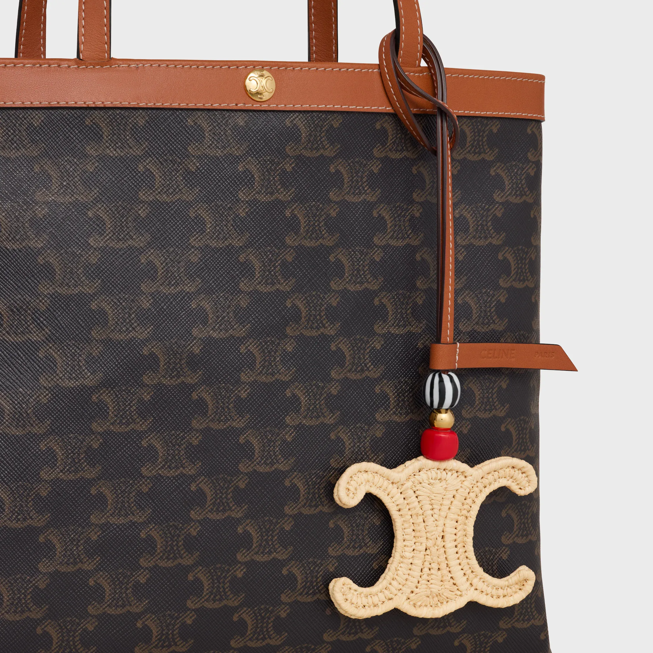 TRIOMPHE CHARM IN RAFFIA AND NATURAL CALFSKIN