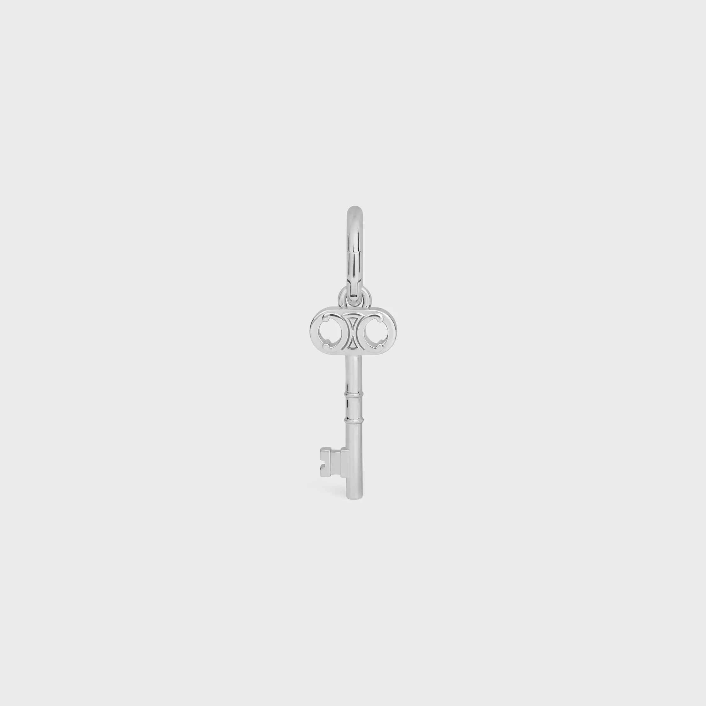 CHARMS TRIOMPHE KEY IN BRASS WITH RHODIUM FINISH