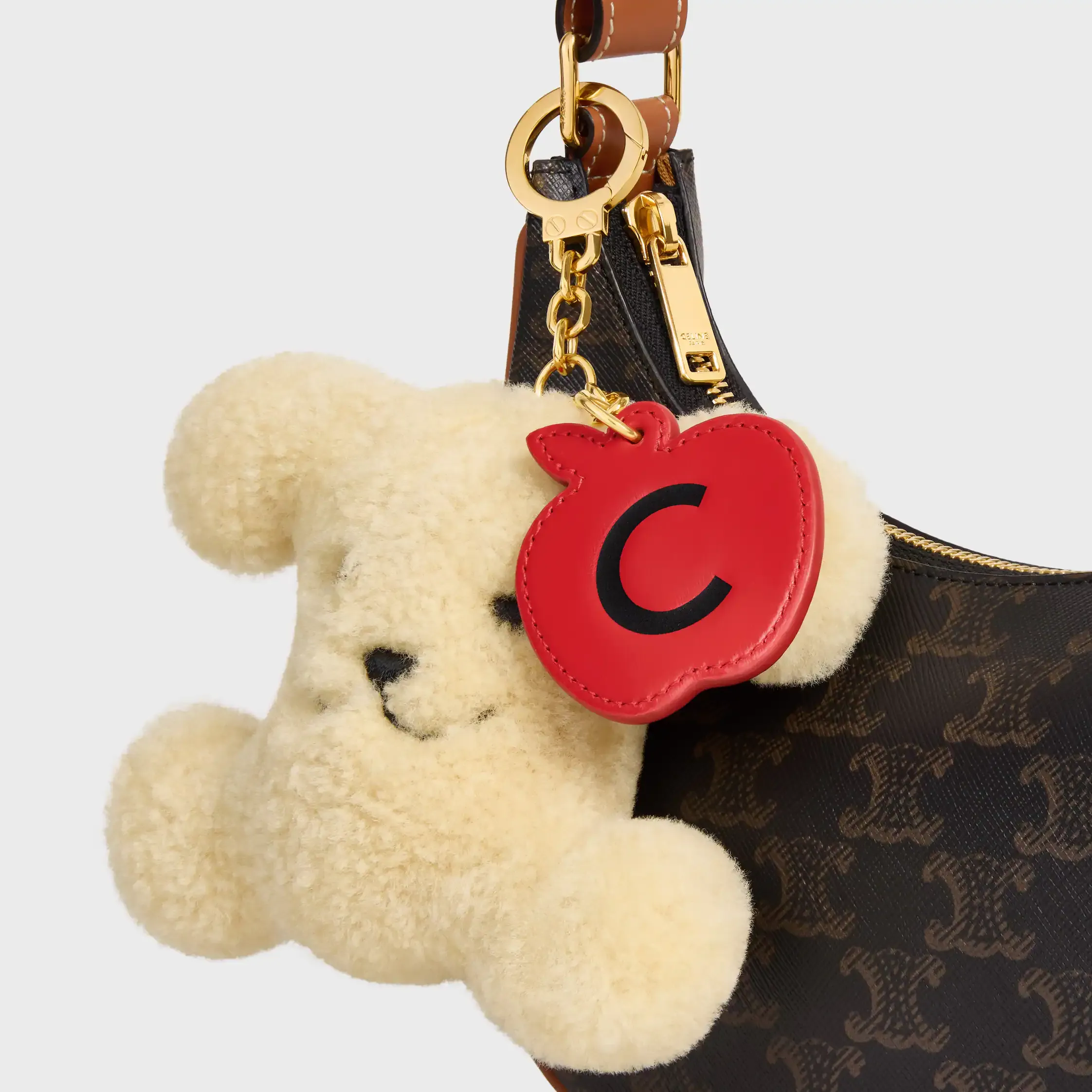 TRIOMPHE POM-POM CHARM APPLE IN SHEARLING AND CALFSKIN