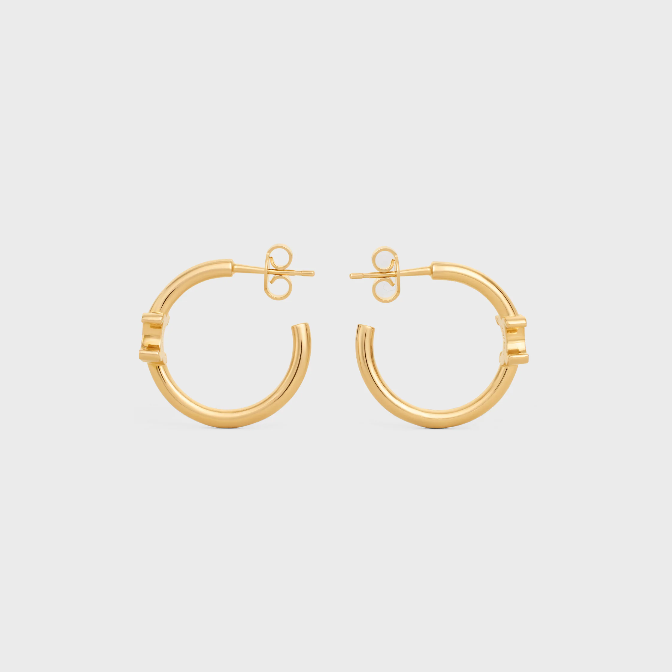 Triomphe Asymmetric Hoops in Brass with Gold Finish