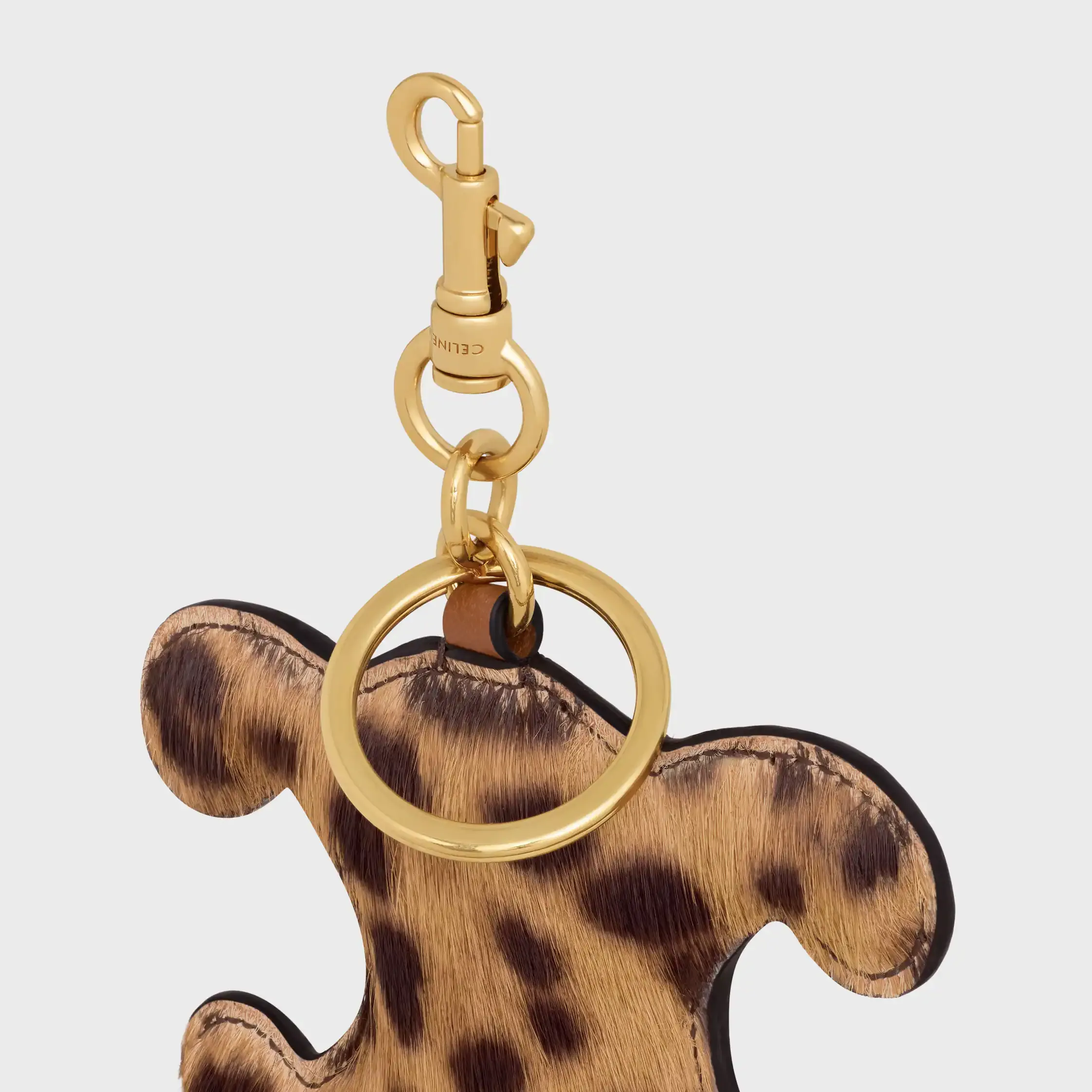TRIOMPHE pom-pom keyring in PONY WITH LEOPARD PRINT AND CALFSKIN
