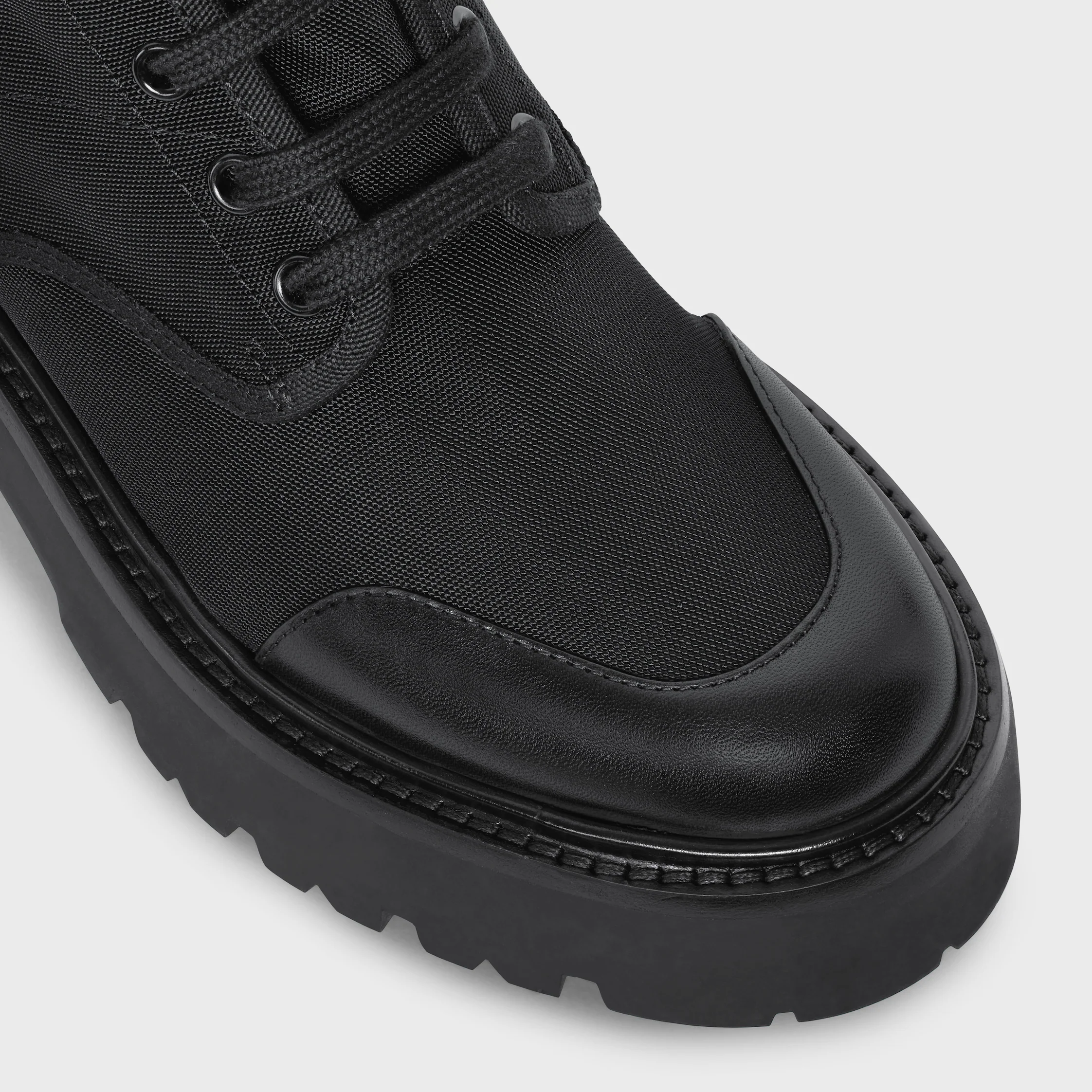 CELINE BULKY LACED UP BOOT in NYLON AND SHINY BULL